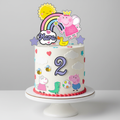 Peppa Pig cake topper on white cake
